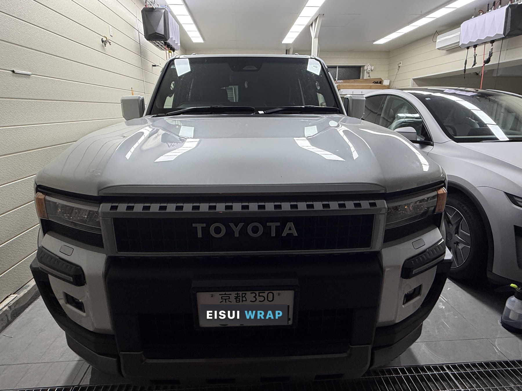 2026 Land Cruiser 250 glossy white paint before clear matte PPF, front view