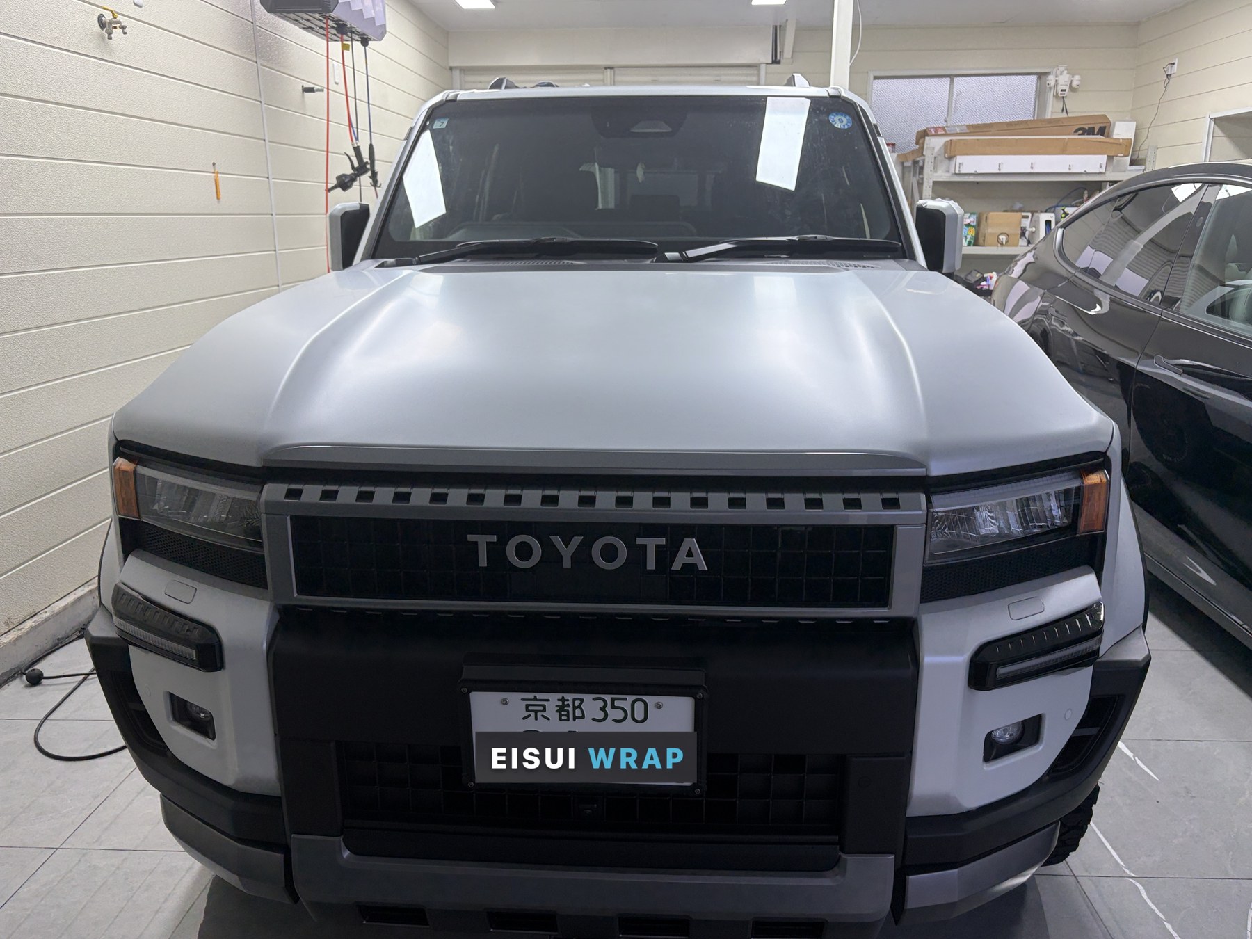 Land Cruiser 250 white body after EISUI clear matte PPF, front view