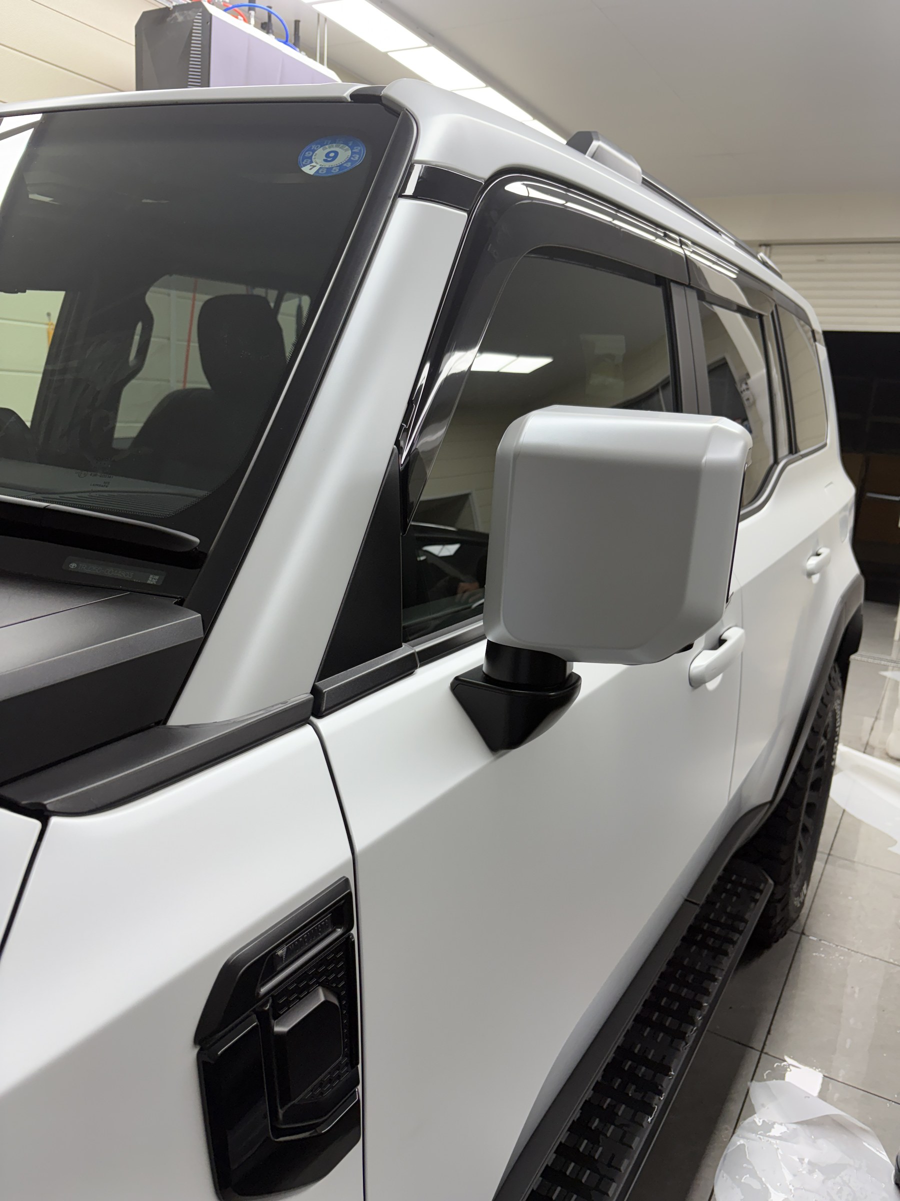 Fender and side detail after clear matte PPF on the Land Cruiser 250