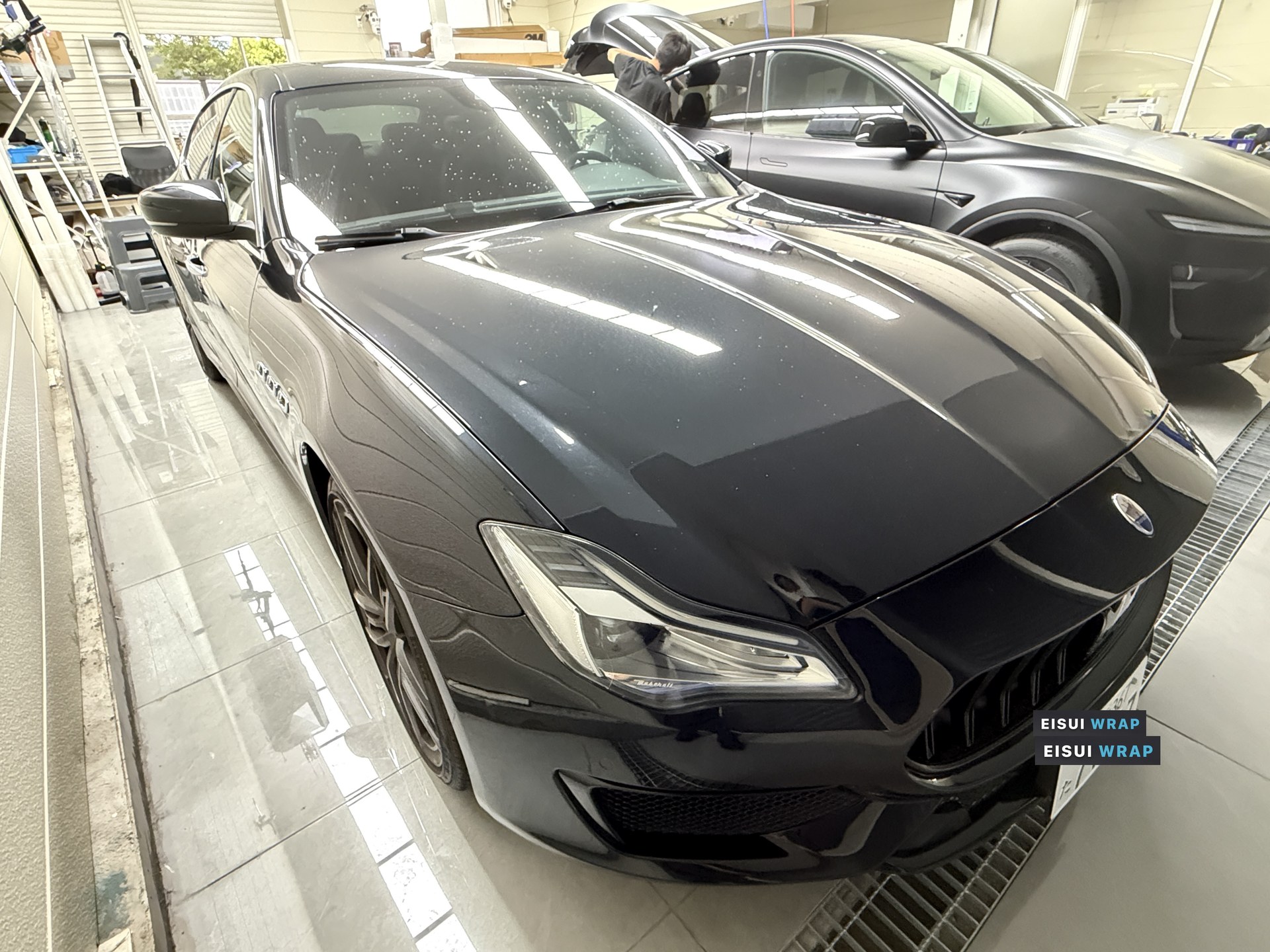 2018 Maserati Quattroporte: Black body before wrapping, opposite front quarter view