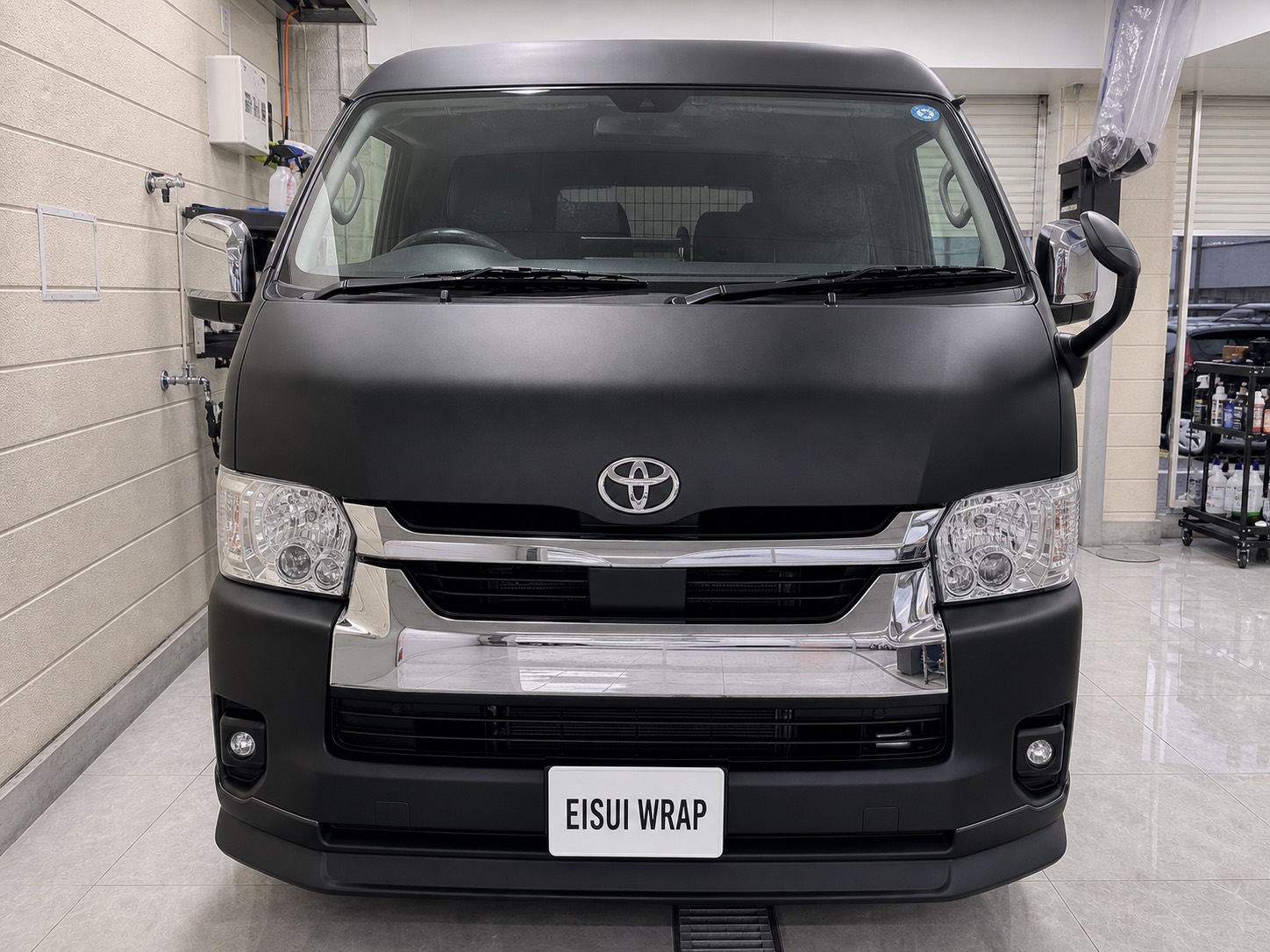 front angle and bumper detail of Toyota Hiace Color PPF Matte Black by EISUI WRAP Osaka