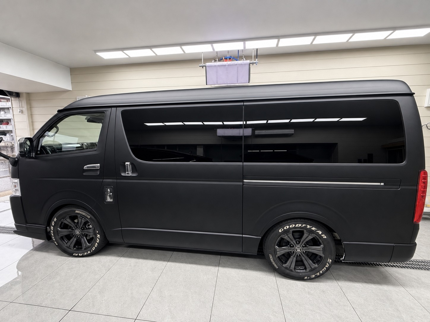 side panel reflection and mirror area of Toyota Hiace Color PPF Matte Black by EISUI WRAP Osaka