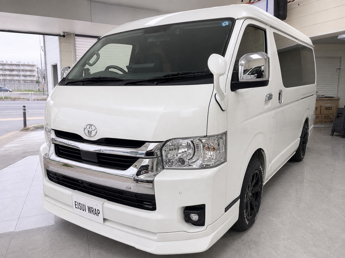 front angle and bumper detail of Toyota Hiace Color PPF Matte Black by EISUI WRAP Osaka