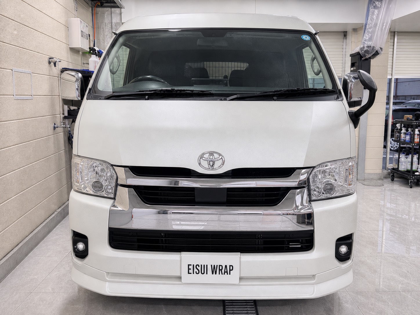 front angle and bumper detail of Toyota Hiace Color PPF Matte Black by EISUI WRAP Osaka