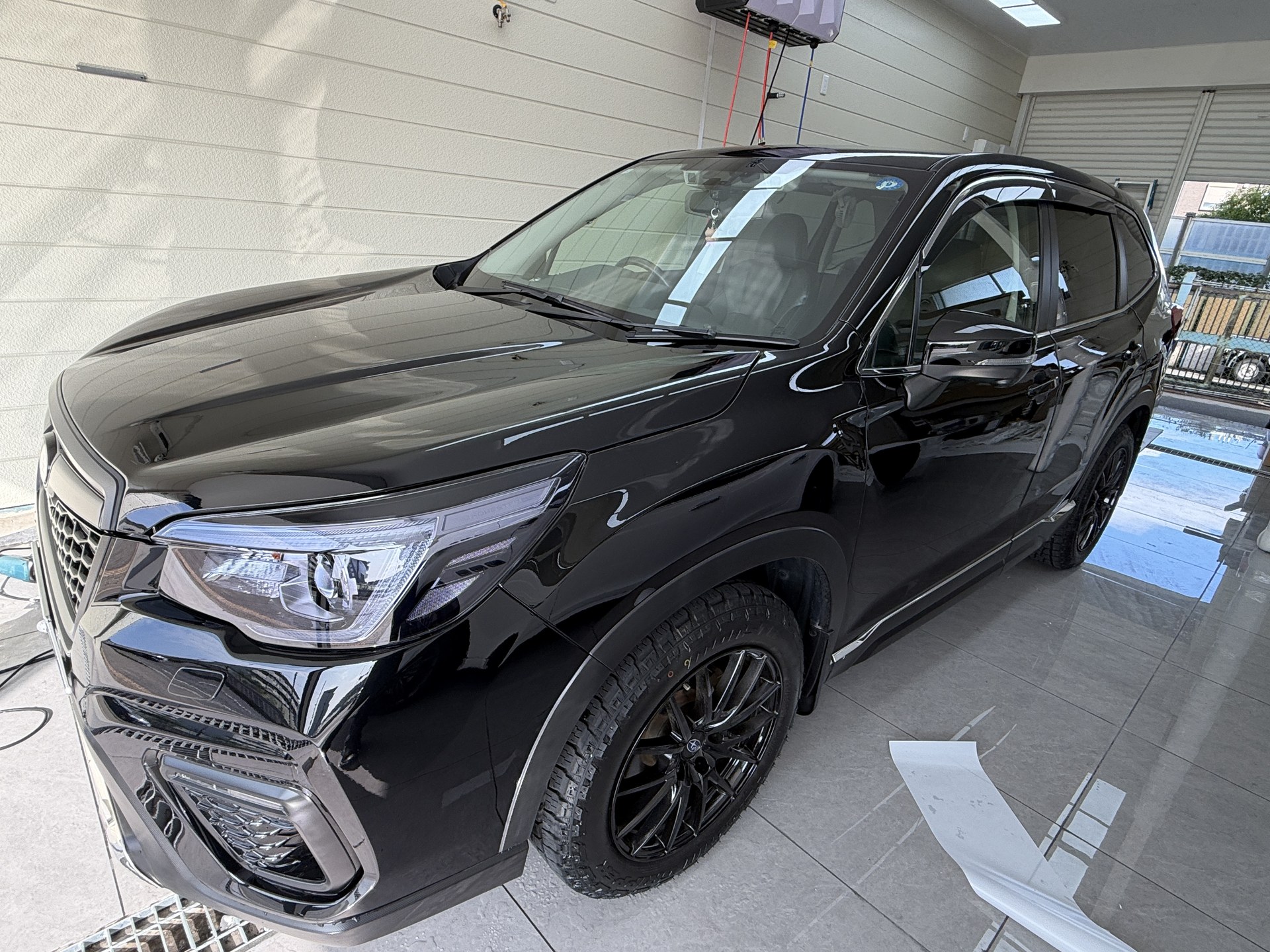Black 2019 Subaru Forester Premium SK9 after EISUI clear PPF installation in Osaka, front three-quarter view