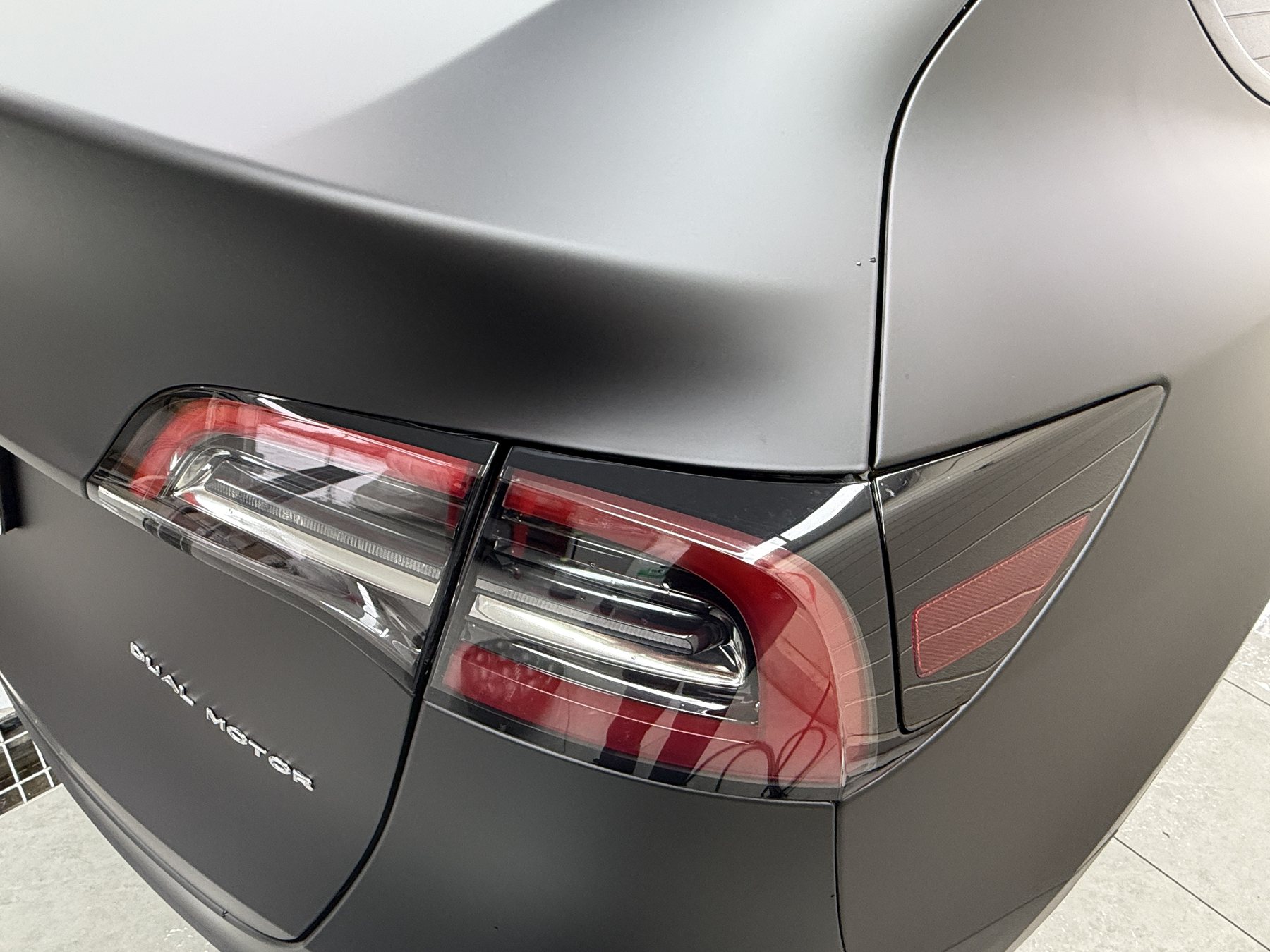 2024 Tesla Model Y after color PPF, tail-light area