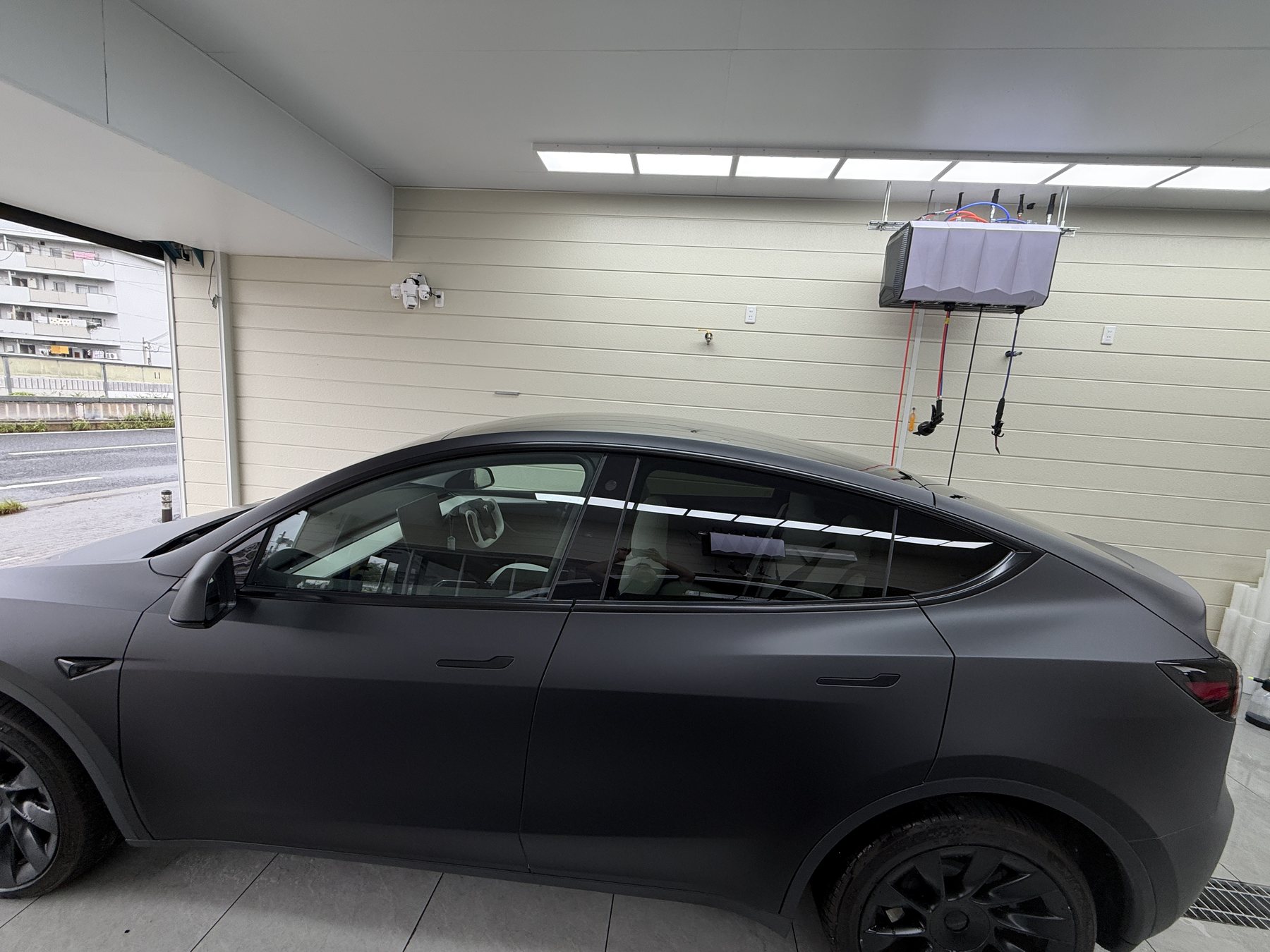 2024 Tesla Model Y matte black after EISUI color PPF, side