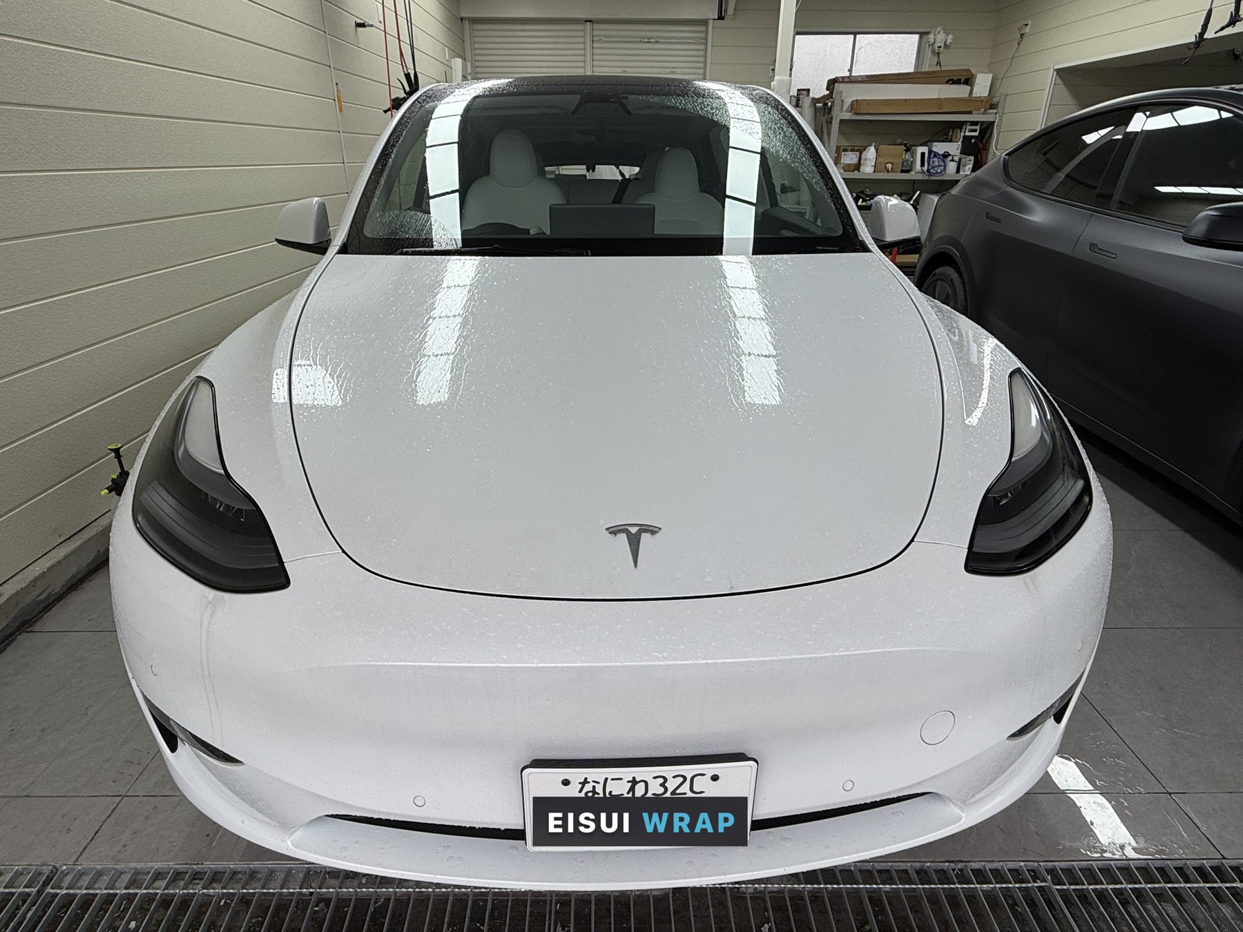 2024 Tesla Model Y before color PPF, pearl-white front