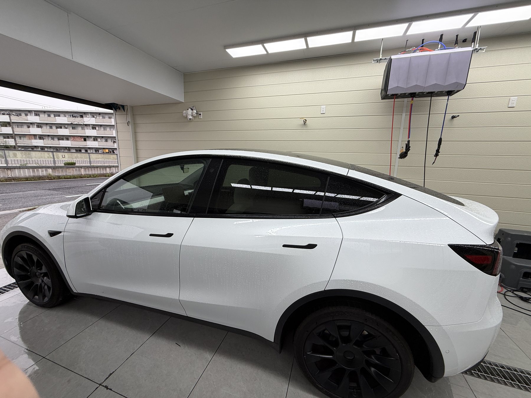 2024 Tesla Model Y pearl white before color PPF, side