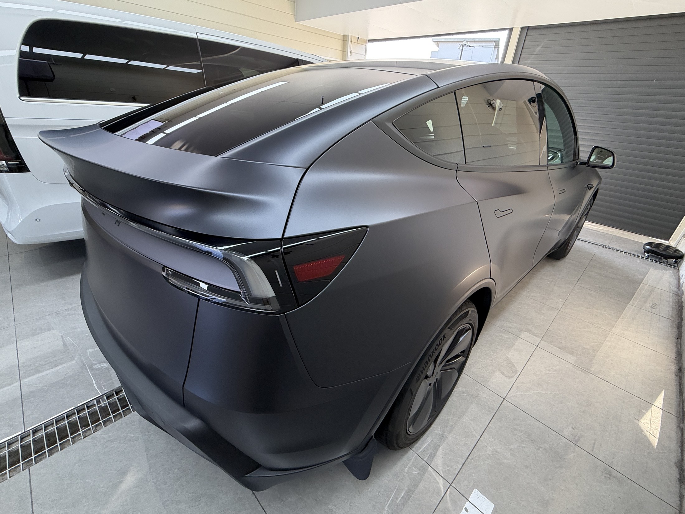 2026 Tesla Model Y Stealth Grey after EISUI matte clear PPF, rear quarter