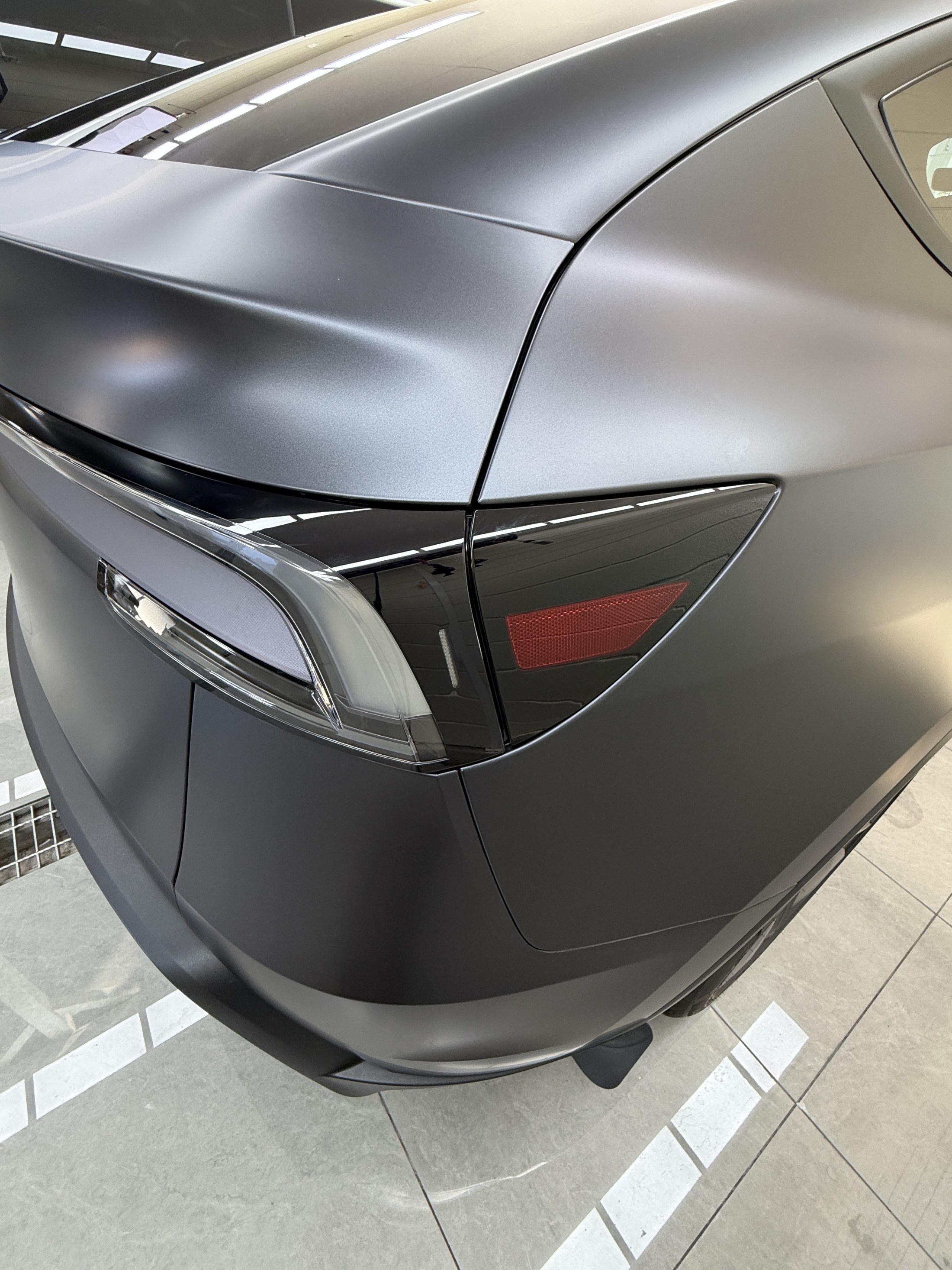 Model Y tail-lamp area after matte clear PPF
