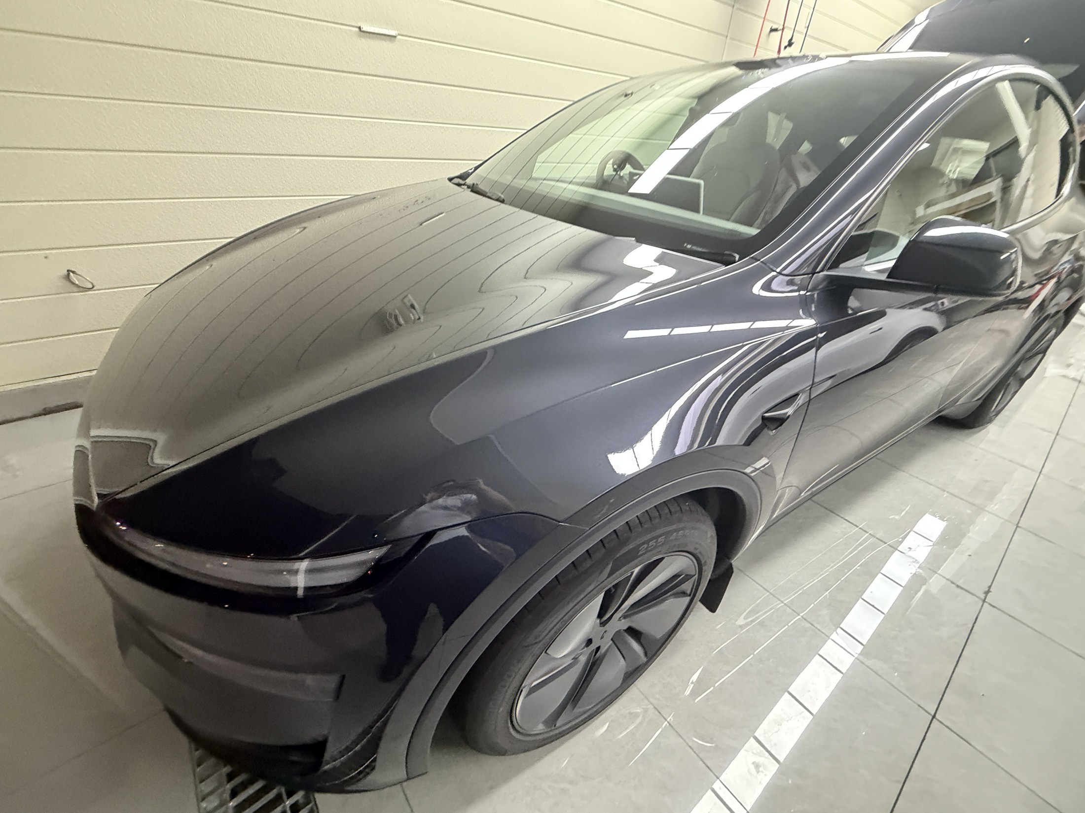 2026 Tesla Model Y Stealth Grey before matte clear PPF, front quarter