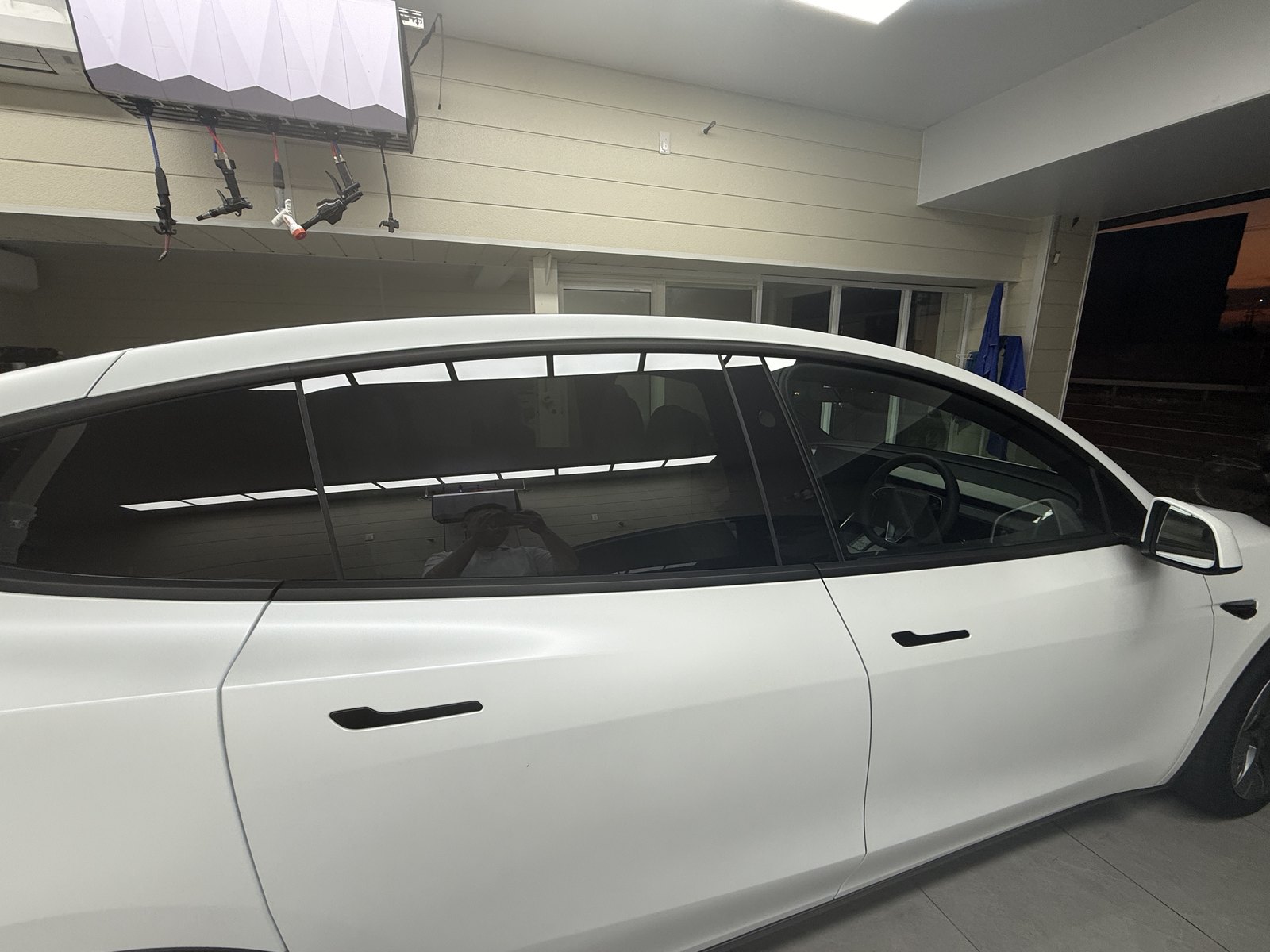 Tesla Model Y L window trim after wrapping in 3M 2080 M12 Matte Black