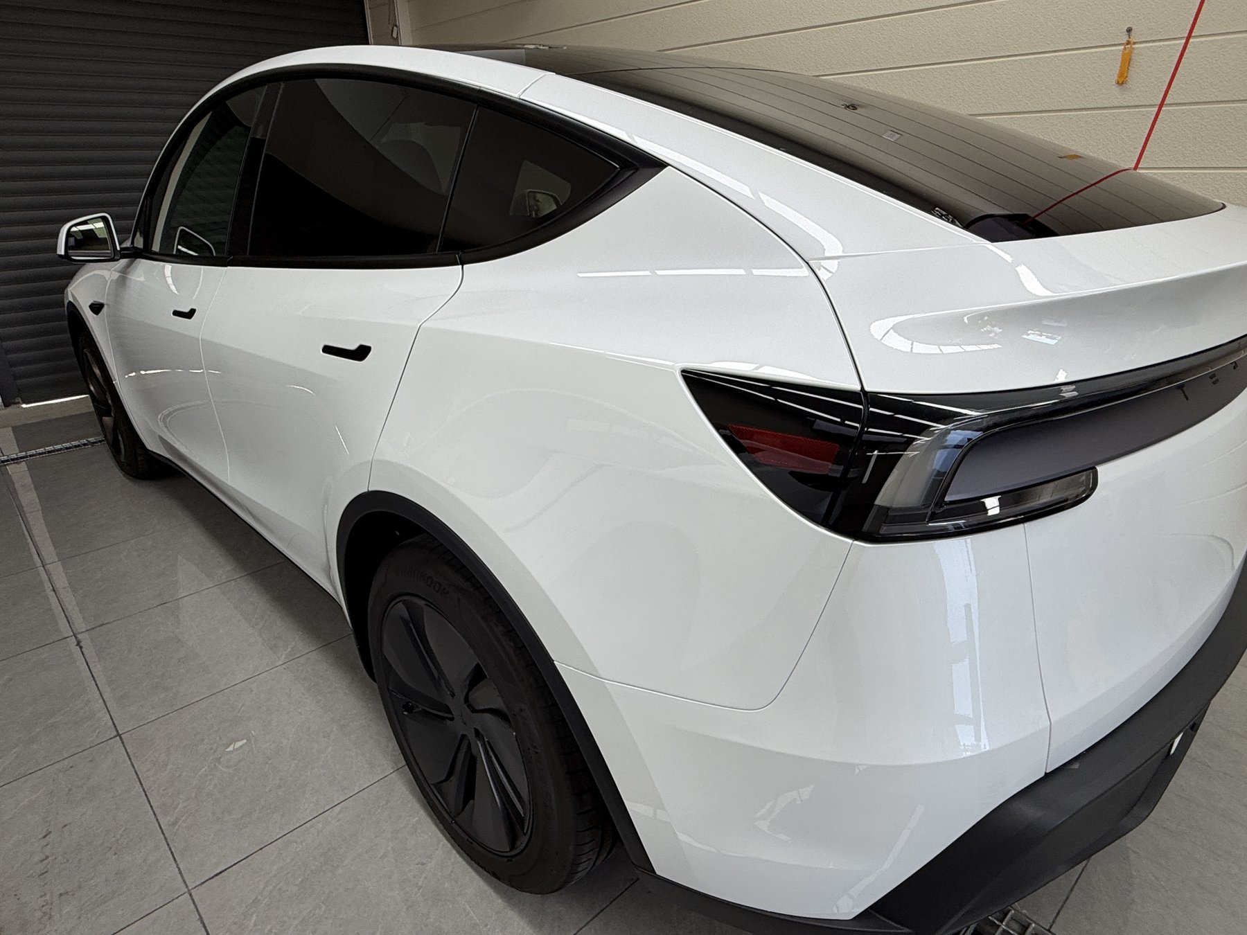 Tesla Model Y Pearl White clear PPF rear quarter