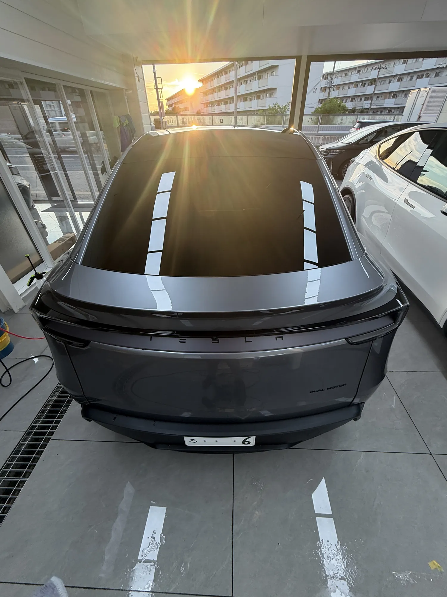 Tesla Model Y Quicksilver clear gloss PPF under natural light