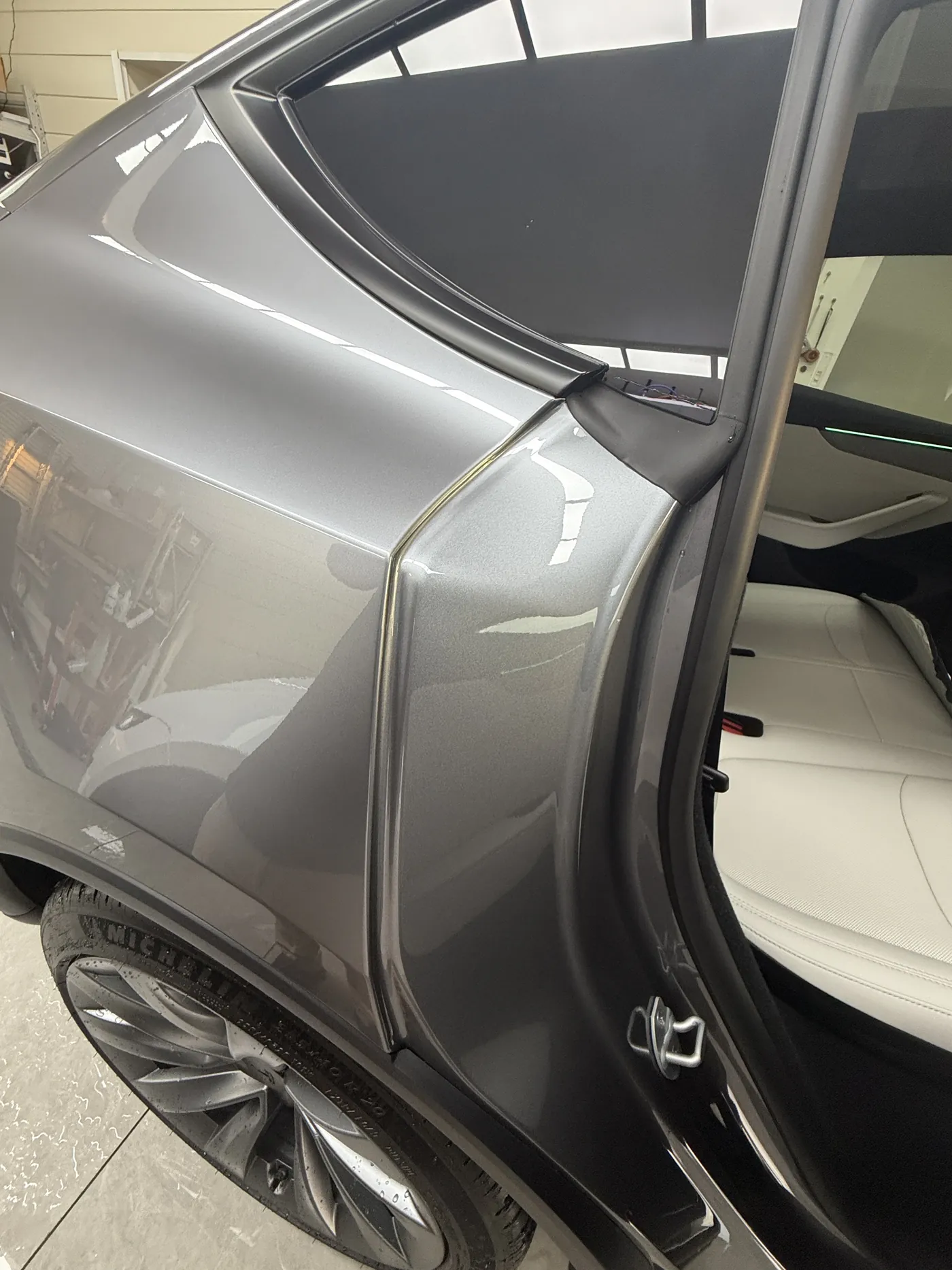 Tesla Model Y Quicksilver clear PPF panel edge detail