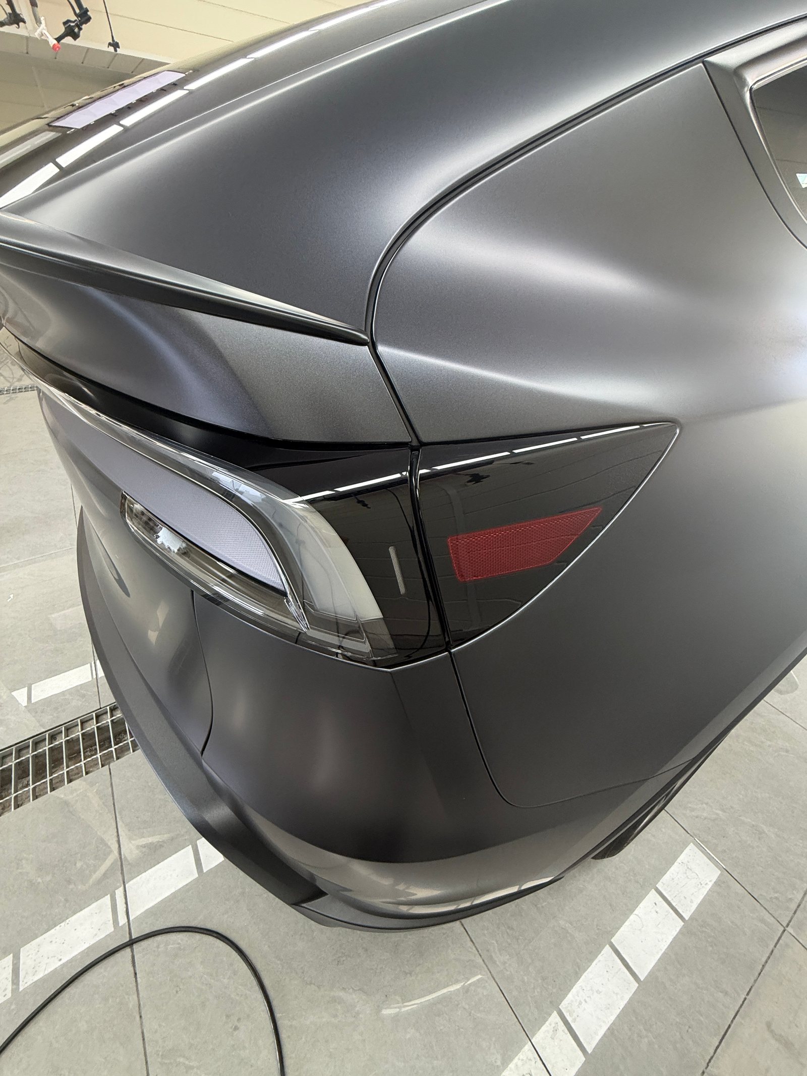 2026 Tesla Model Y L Stealth Grey, After: rear corner