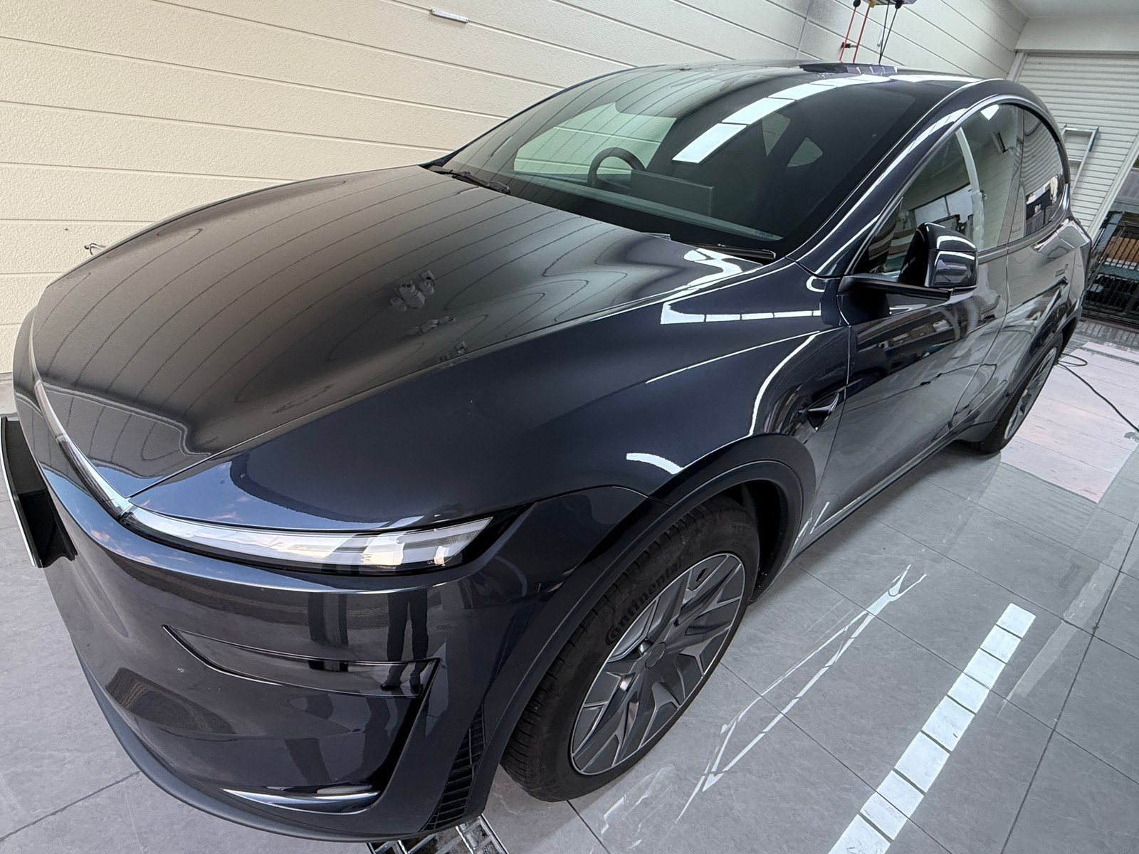 2026 Tesla Model Y L Stealth Grey, Before: front quarter